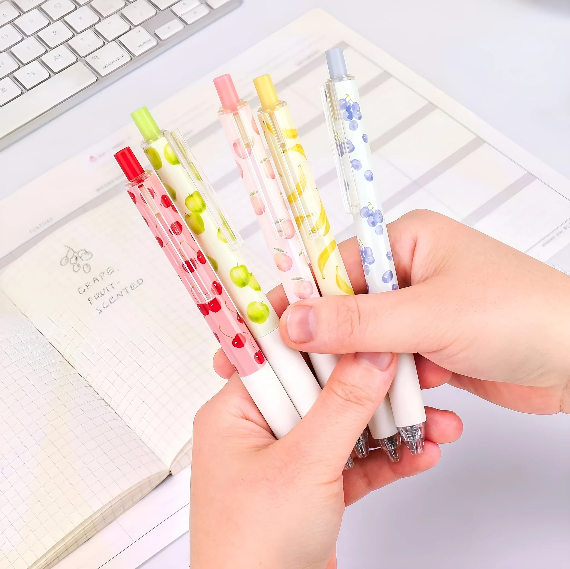 Fruit scented pressurised gel pen with 0.5mm black ink and plastic barrel