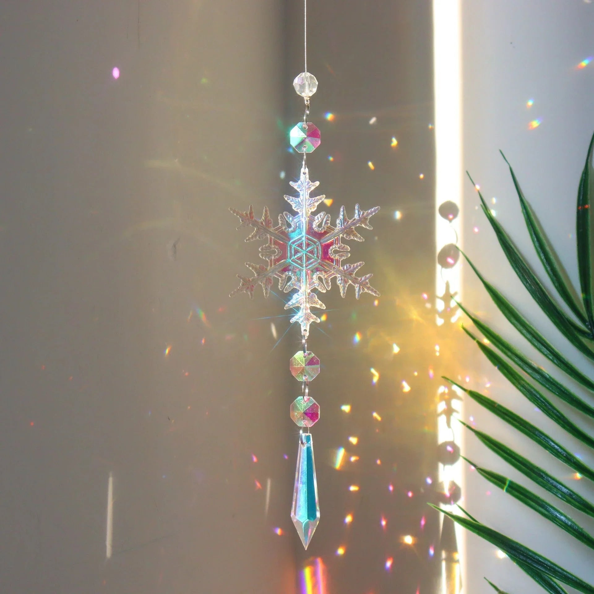 Snowflake Crystal Sun Catcher with intricate design and iridescent AB color finish, creates a mesmerizing kaleidoscope of colors