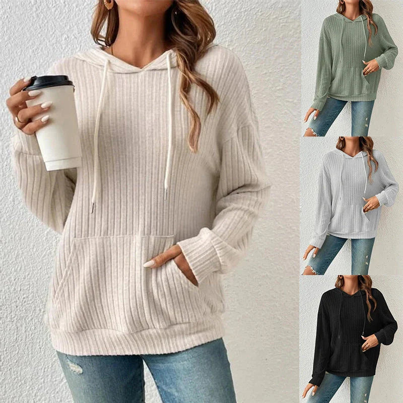 A stylish and comfortable hooded sweatshirt with drawstring and pockets, available in various colors.