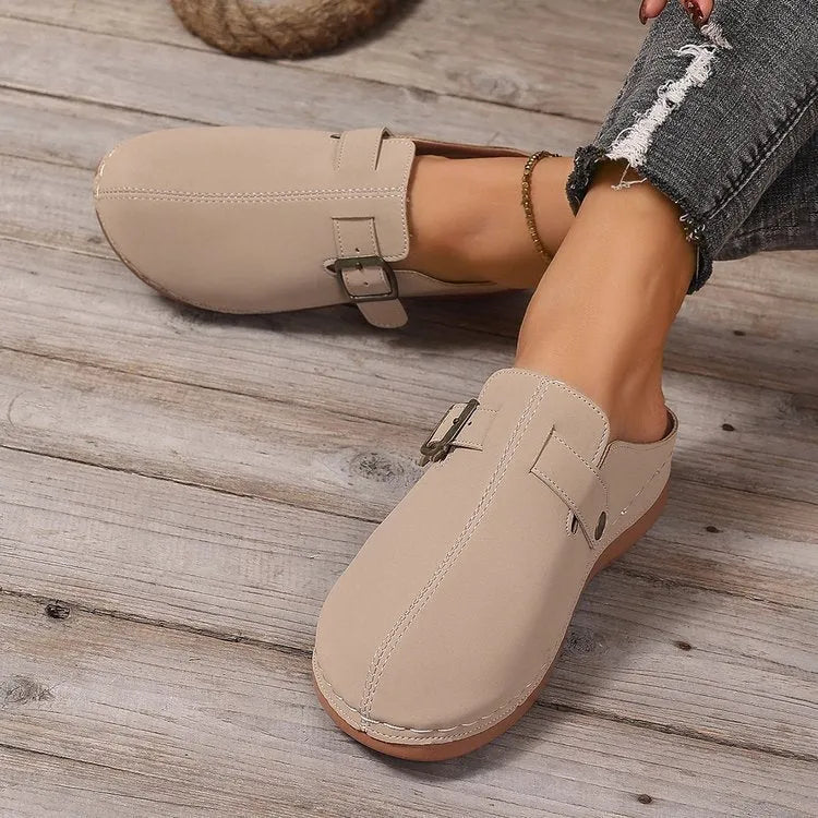 Women's casual wedge slippers in cloth with a rubber sole, shown in light brown colour.