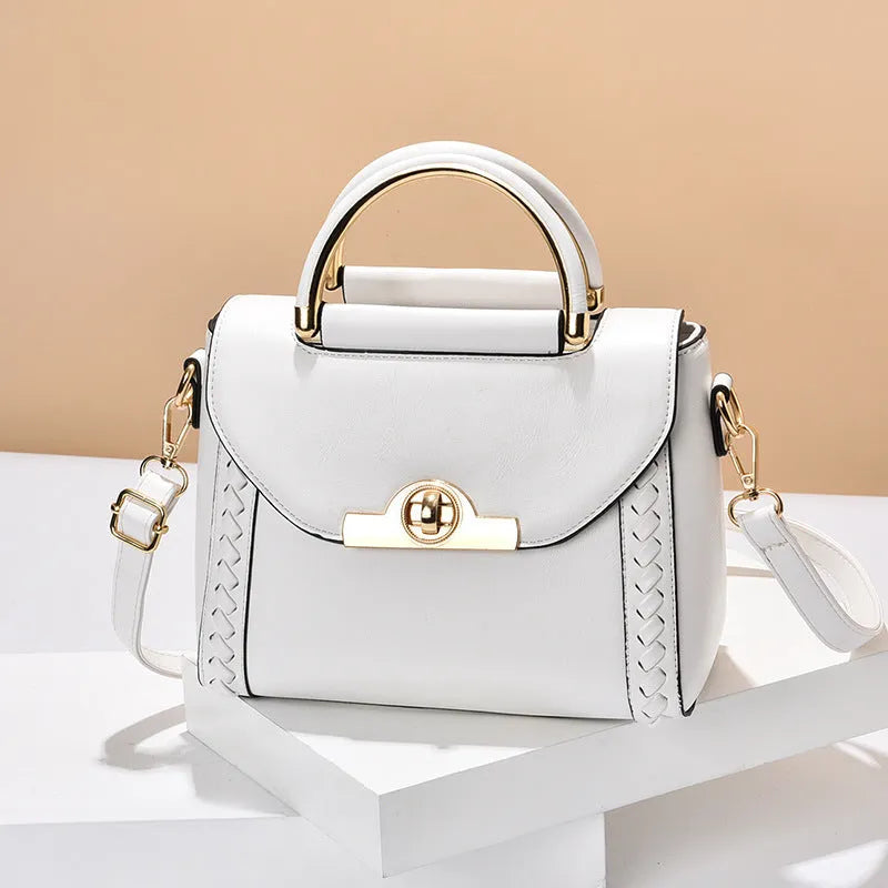 Women's PU leather crossbody messenger bag with double connector strap, soft handle, horizontal square shape, sold in black white or green