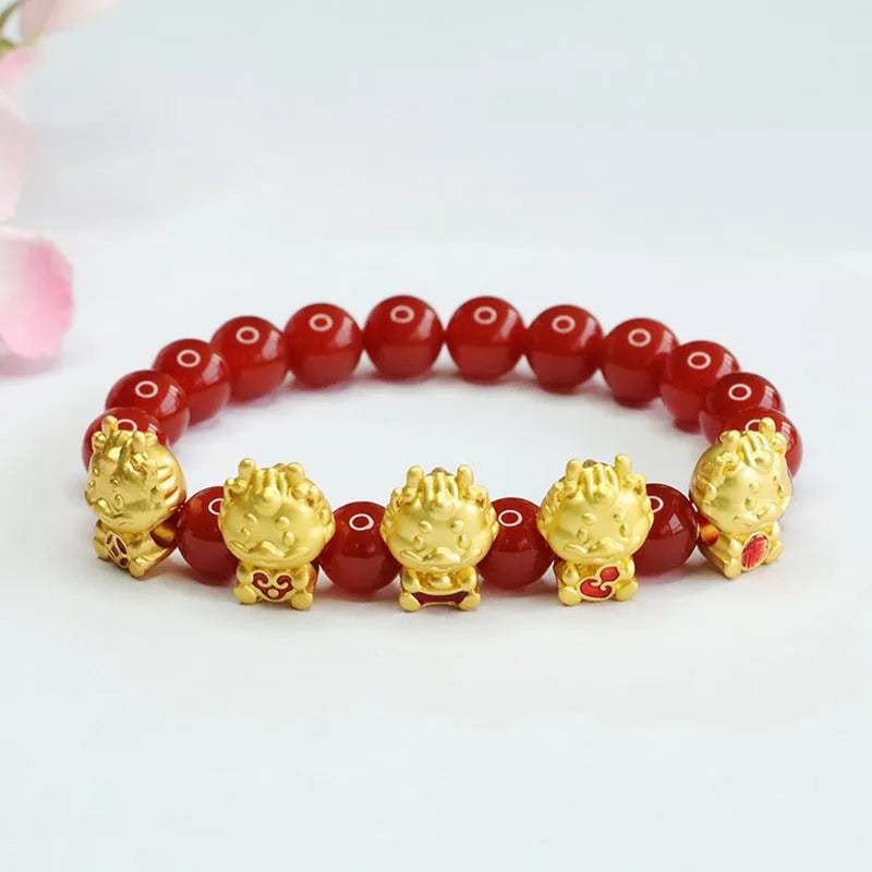 Red agate bracelet with carved five blessing dragon motifs on 8mm beads.
