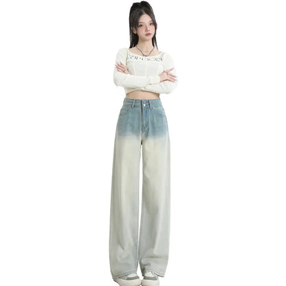 Women's gradient blue denim straight-leg trousers with 100% cotton fabric, showing colour transition and straight-leg silhouette