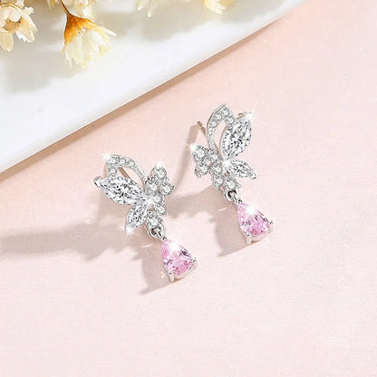 Butterfly shaped silver stud earrings with Swarovski crystal details on wings