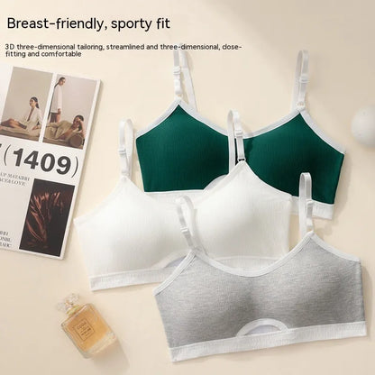 White underwired sports bra set with contrast dark grey back detailing and matching briefs on a mannequin.