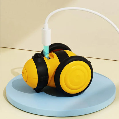 Electric cat toy with bee design and feather teaser in pink or yellow colour options
