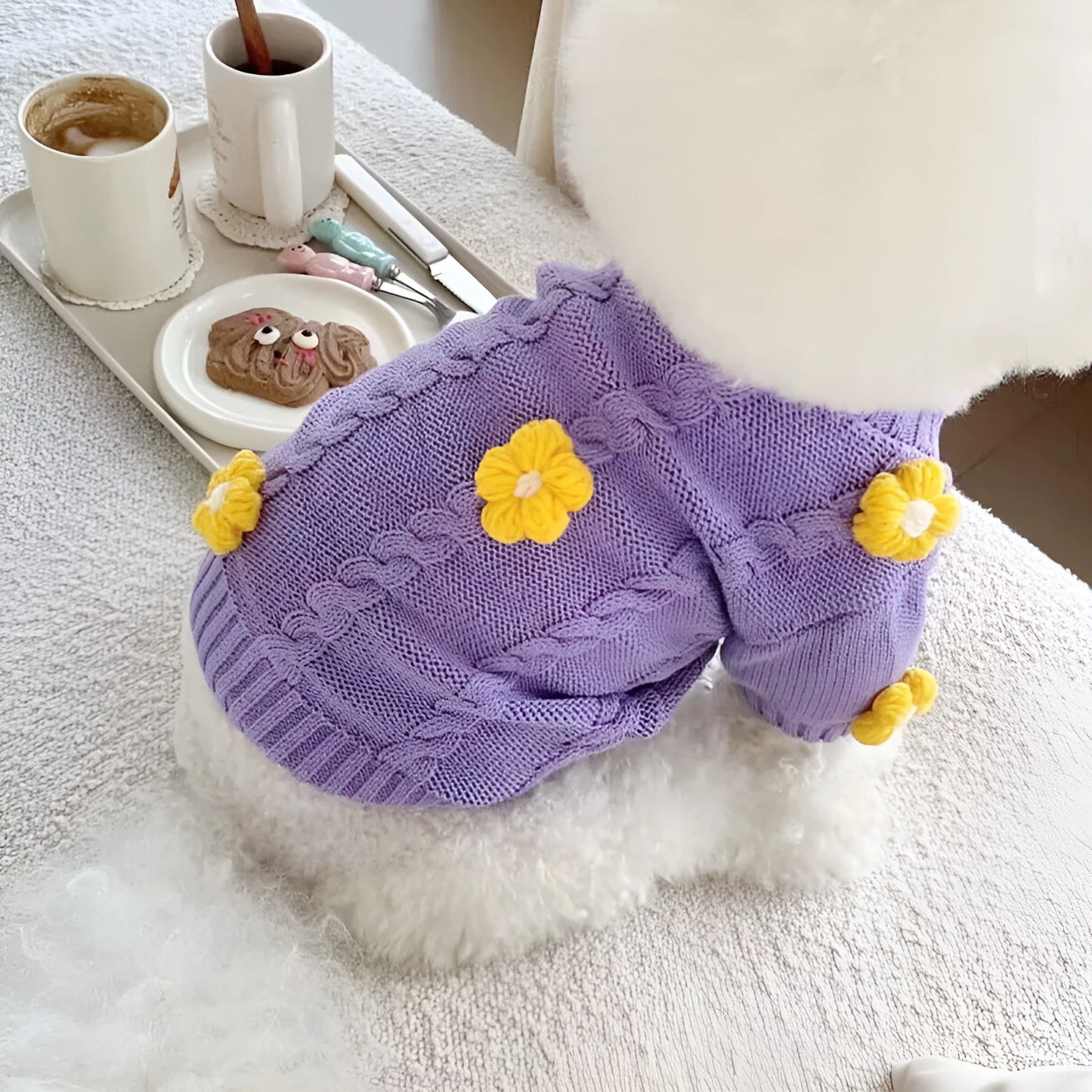 Purple flower print knitted dog clothing shown on small dog with size indicators