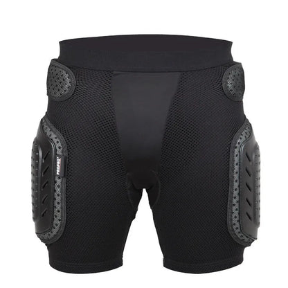 Black cycling hip protection pants shown laid flat, designed for impact safety during sports.