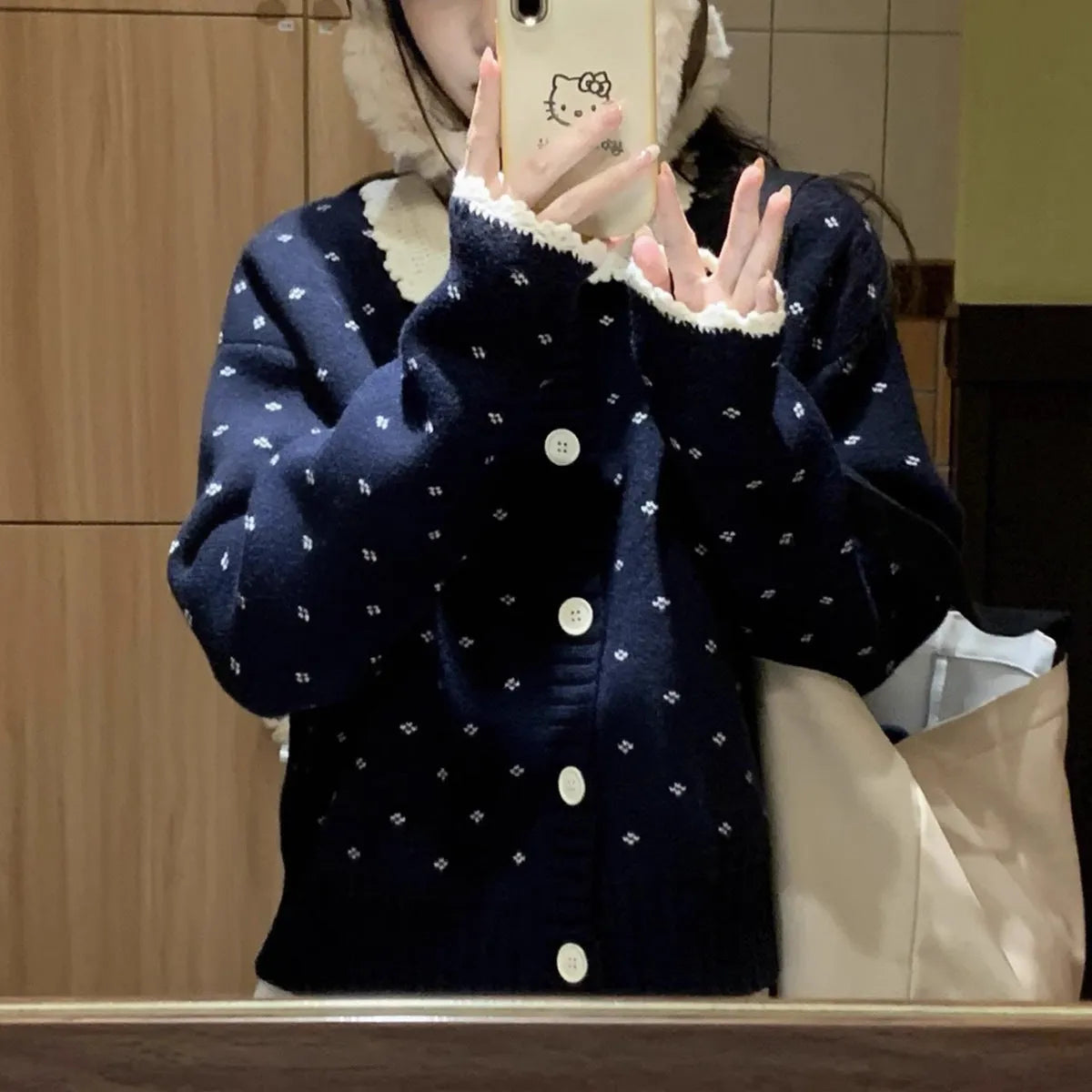 Women's floral pattern knit cardigan with Peter Pan collar in navy blue colour