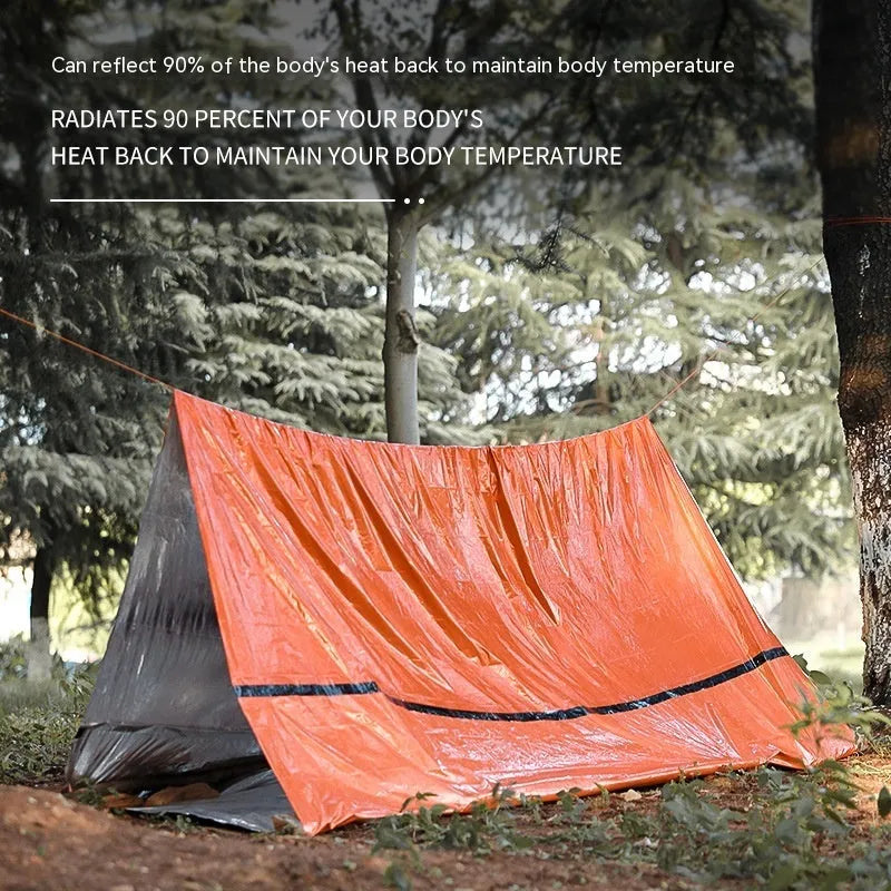 Emergency survival tent with simple sleeping bag warm emergency blanket kit for outdoor disaster relief camping, portable temporary shelter in orange or green colour options measuring 240cm by 150cm with included whistle and SUV bag