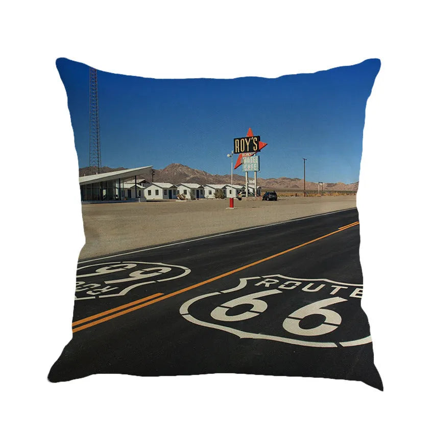 Us Route 66 linen cushion cover with landscape pattern in 45x45cm size, shown in one of six colour options on a sofa.