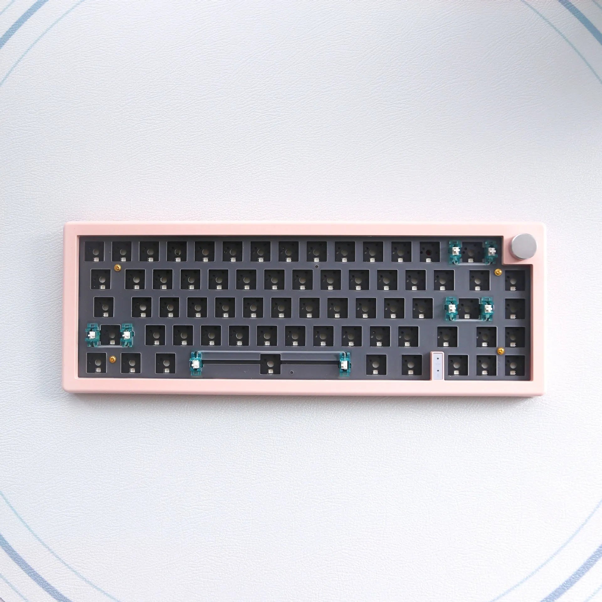 Custom DIY mechanical keyboard kit with RGB backlighting in seven colour options