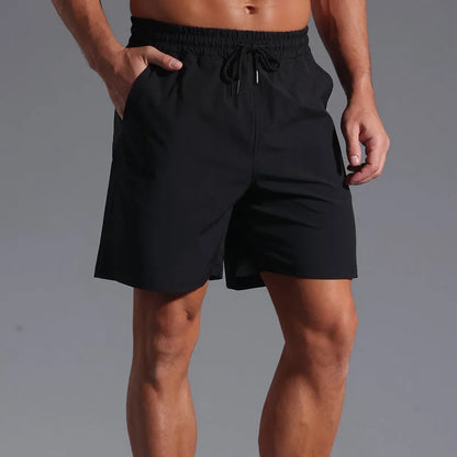 Men's loose-fitting casual shorts in quick-drying polyester available in four colours
