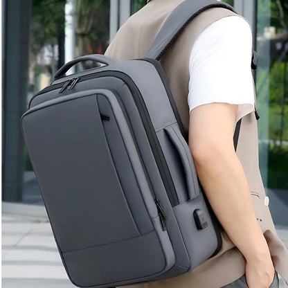 Black large capacity waterproof Oxford backpack with shoulder straps and a top carry handle.