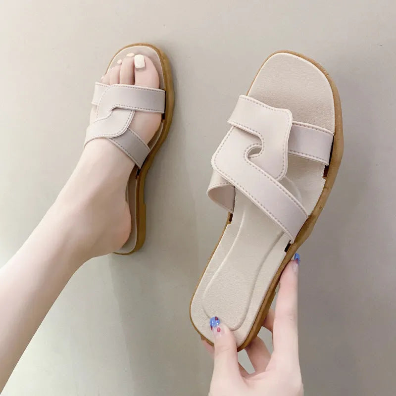 Women's PVC toe ring slippers with solid colour cross straps and non-slip sole