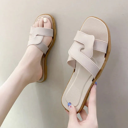 Women's PVC toe ring slippers with solid colour cross straps and non-slip sole