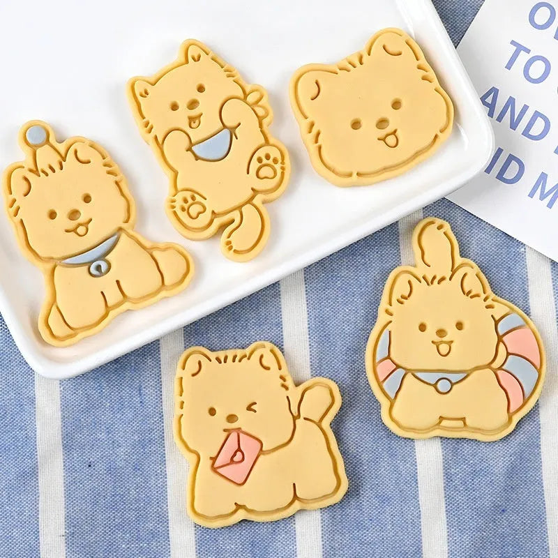 Three-dimensional puppy biscuit mould showing raised details for creating themed baked goods with seven design options