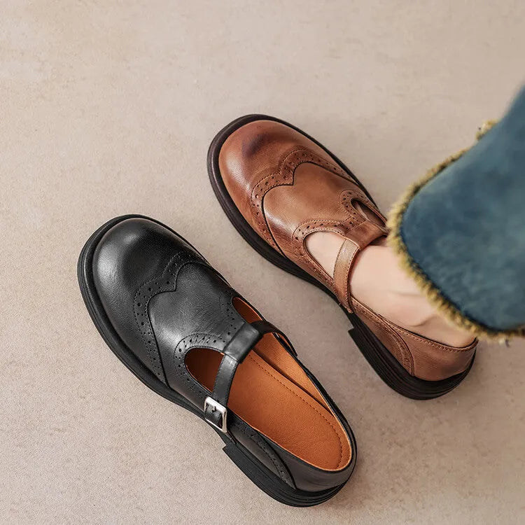 Women's black and brown round-toe flat casual shoes made from sheepskin leather.