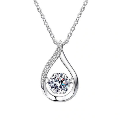 Elegant drop-shaped necklace in luxurious white gold, featuring a captivating water droplet design