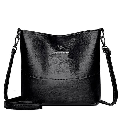 Women's soft leather bucket shoulder bag in black, wine red, or ginger yellow with large capacity and minimalist design
