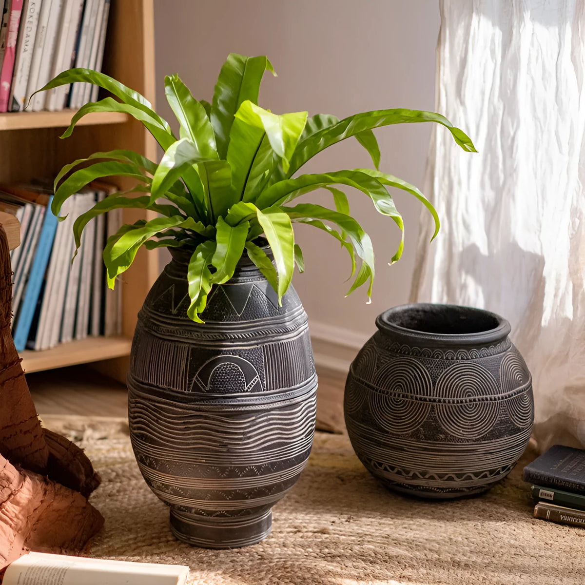 Medium cement African Ancient Tank style flower pot with a textured finish and drainage hole.