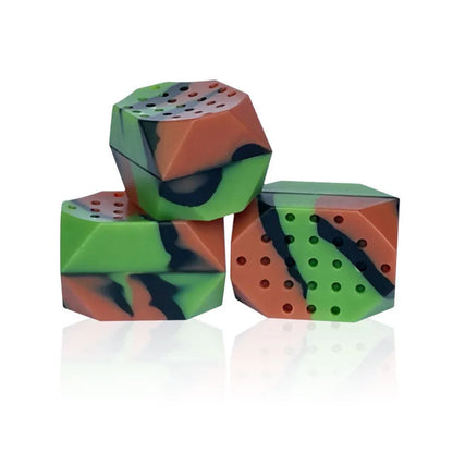 Two camouflage silicone facial muscle fitness balls for jaw training.