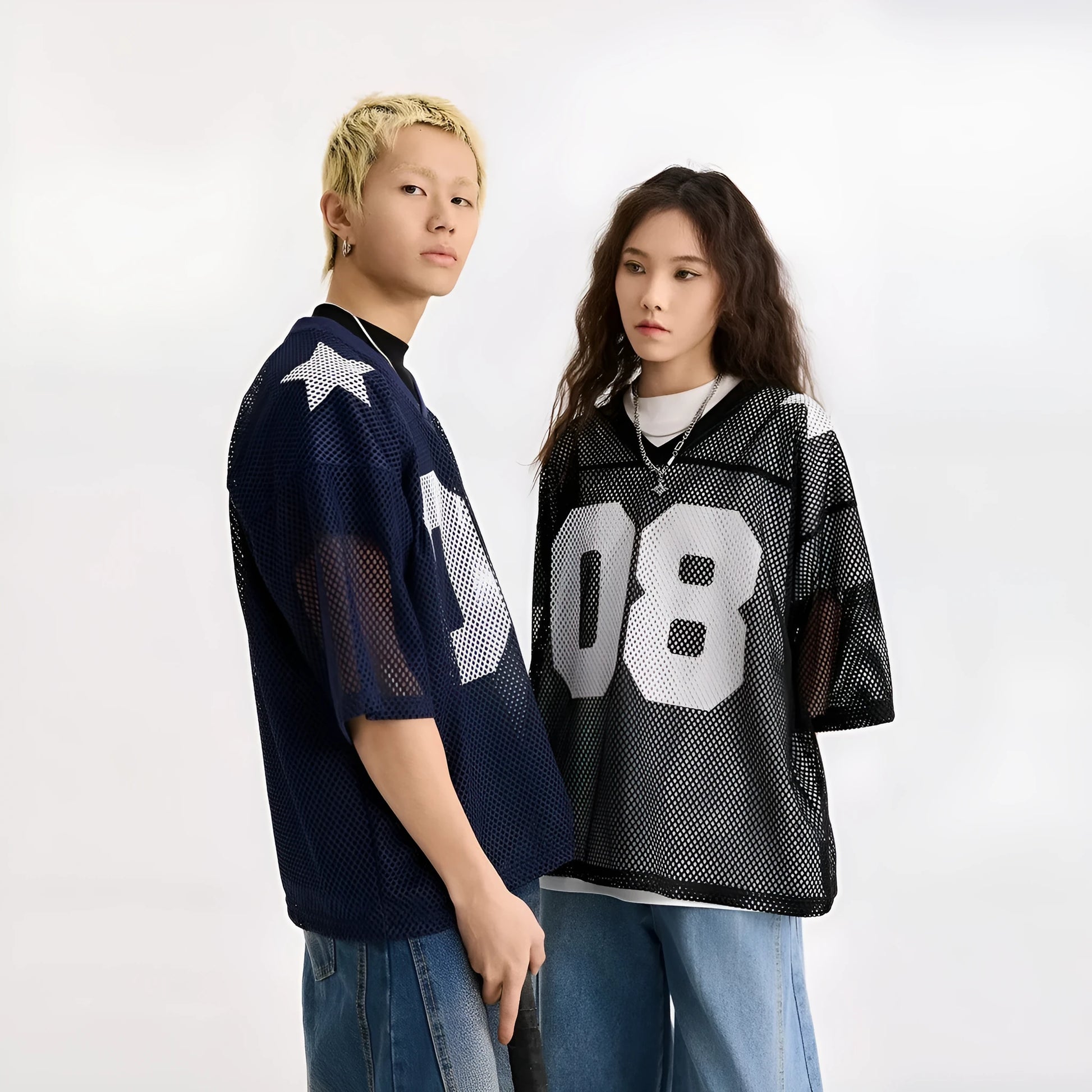 Black half sleeve loose fit shirt with white letter print, short sleeves, pullover style.