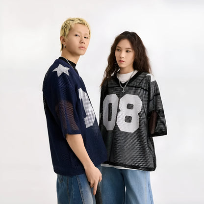 Black half sleeve loose fit shirt with white letter print, short sleeves, pullover style.