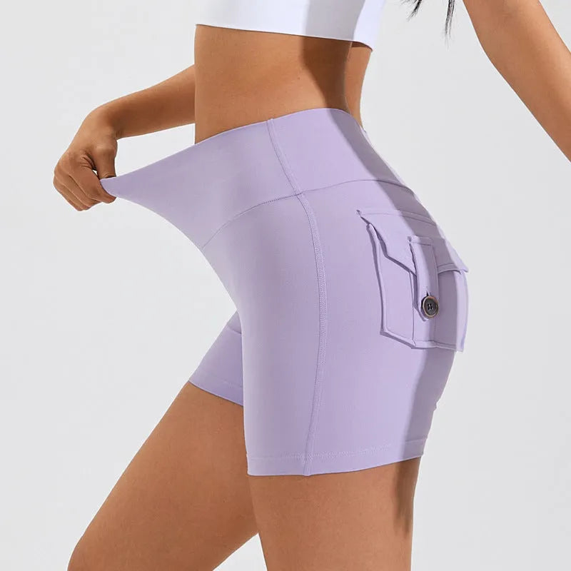Women's high-waist quick-dry fitness shorts with side pockets in avocado green colour