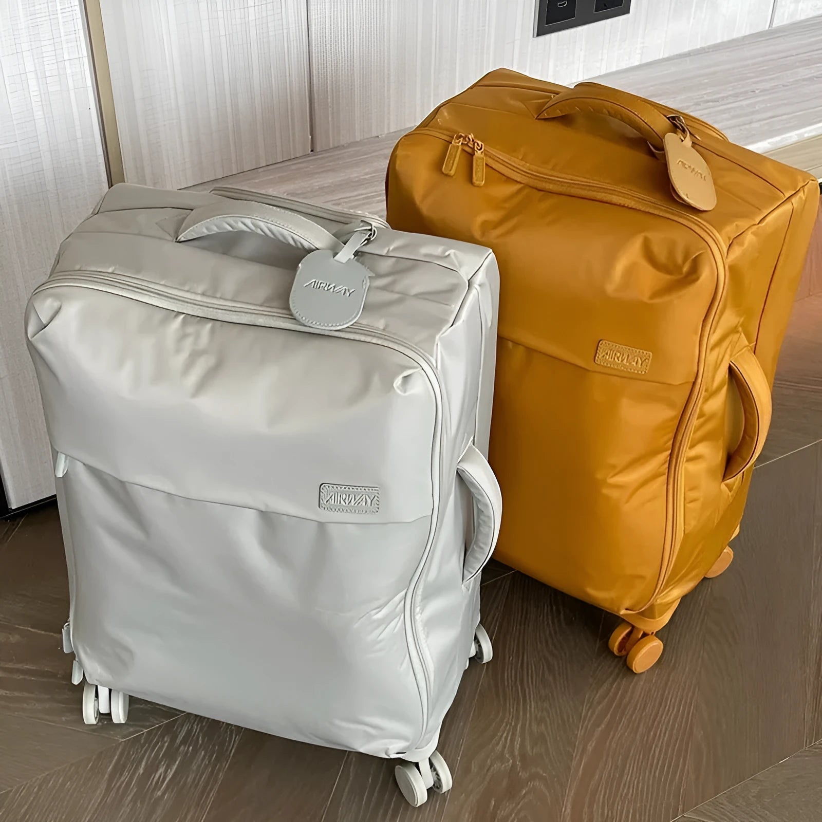 Ultra-light waterproof Oxford cloth suitcase in bluestone green with universal wheels showing 20-inch size dimensions