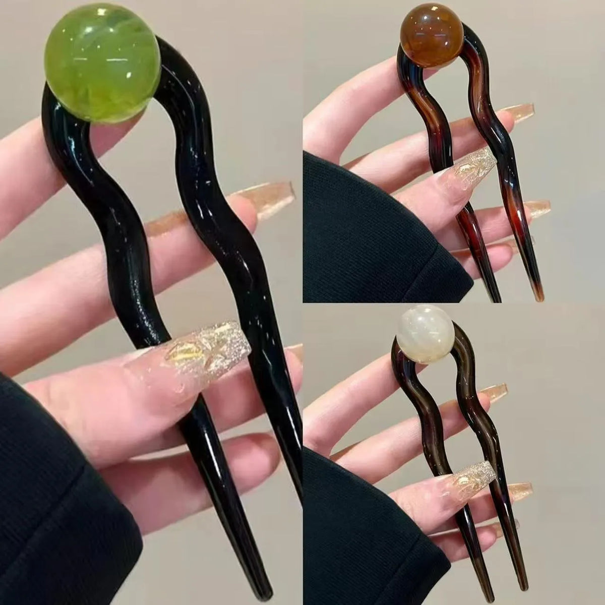 A set of U-shaped acrylic hair barrettes with a simple ball decoration in beige, caramel, and dark grey colours.
