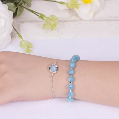 Double-layer women's bracelet with lucky beads and colourful crystals in gold-toned setting