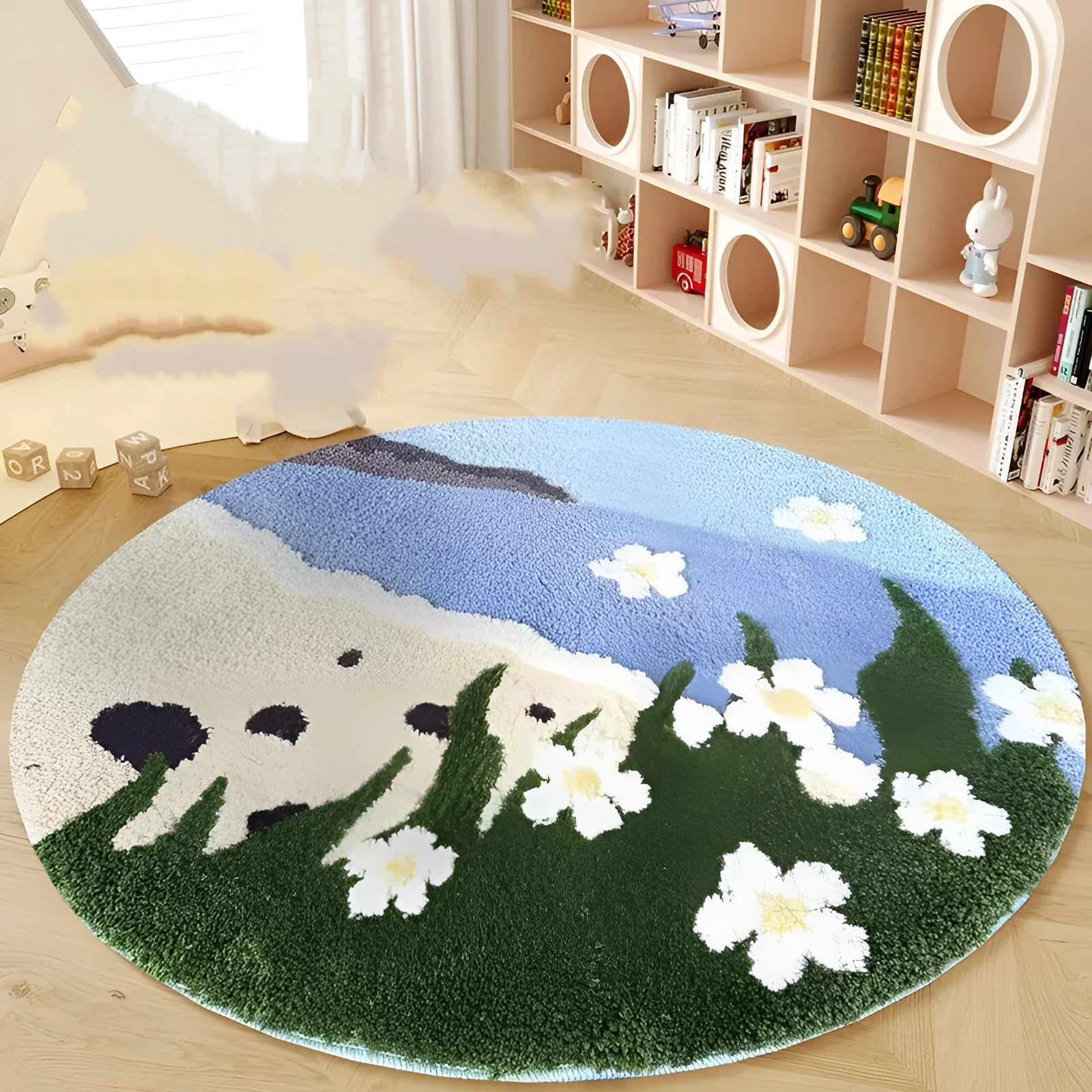 Round blue children's carpet with cartoon snow mountain and Hailang graphic on polyester fabric.