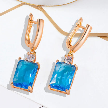 Square geometric earrings with gold electroplated finish on copper base