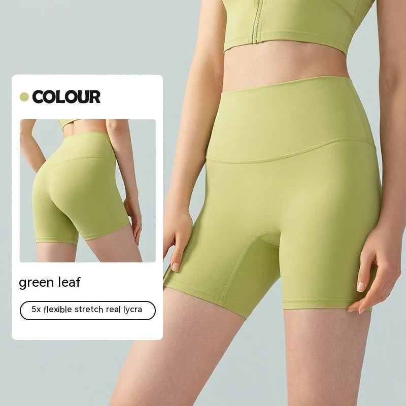 Women's high-waist Lycra yoga shorts in leaf green for yoga and fitness