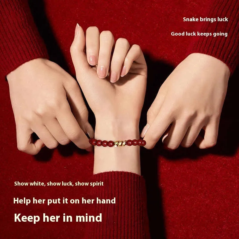Handmade Chinese zodiac snake bracelet with genuine cinnabar beads in traditional design