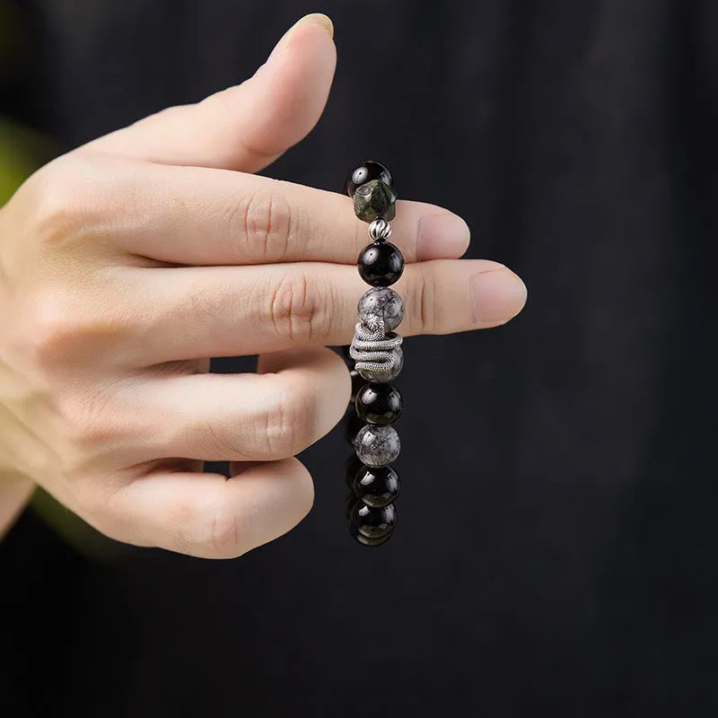 Men's black S925 sterling silver bracelet with obsidian crystal and snake zodiac design