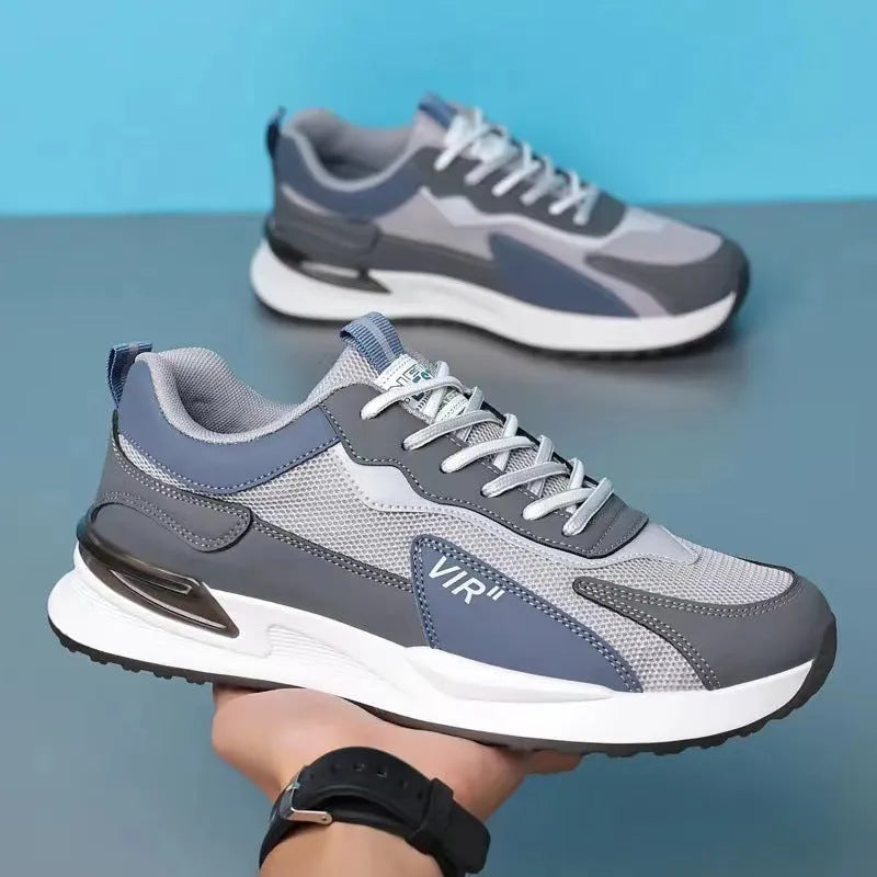 Men's colour block mesh sneakers in black, grey, and white with lace-up front and low-top design
