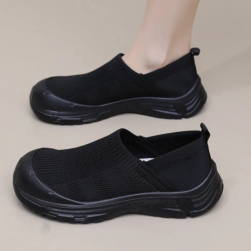 Women's black one pedal slip-on shoes with breathable cloth upper and PVC sole
