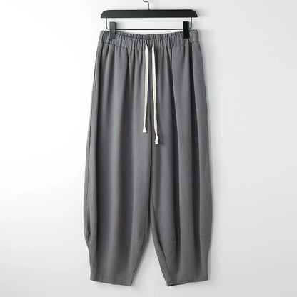 Loose linen harem pants with ankle ties in neutral colours for plus sizes