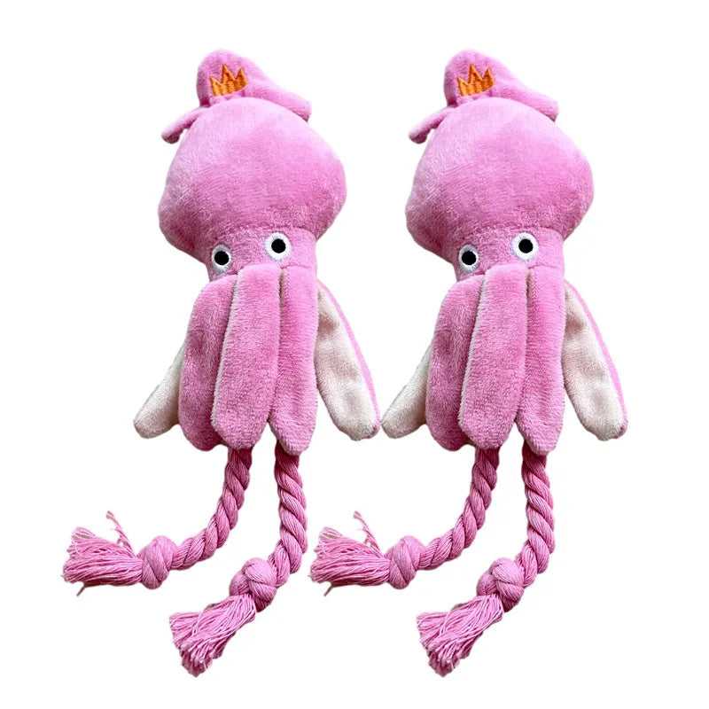 Pink squid-shaped corduroy plush dog toy with a squeaker.