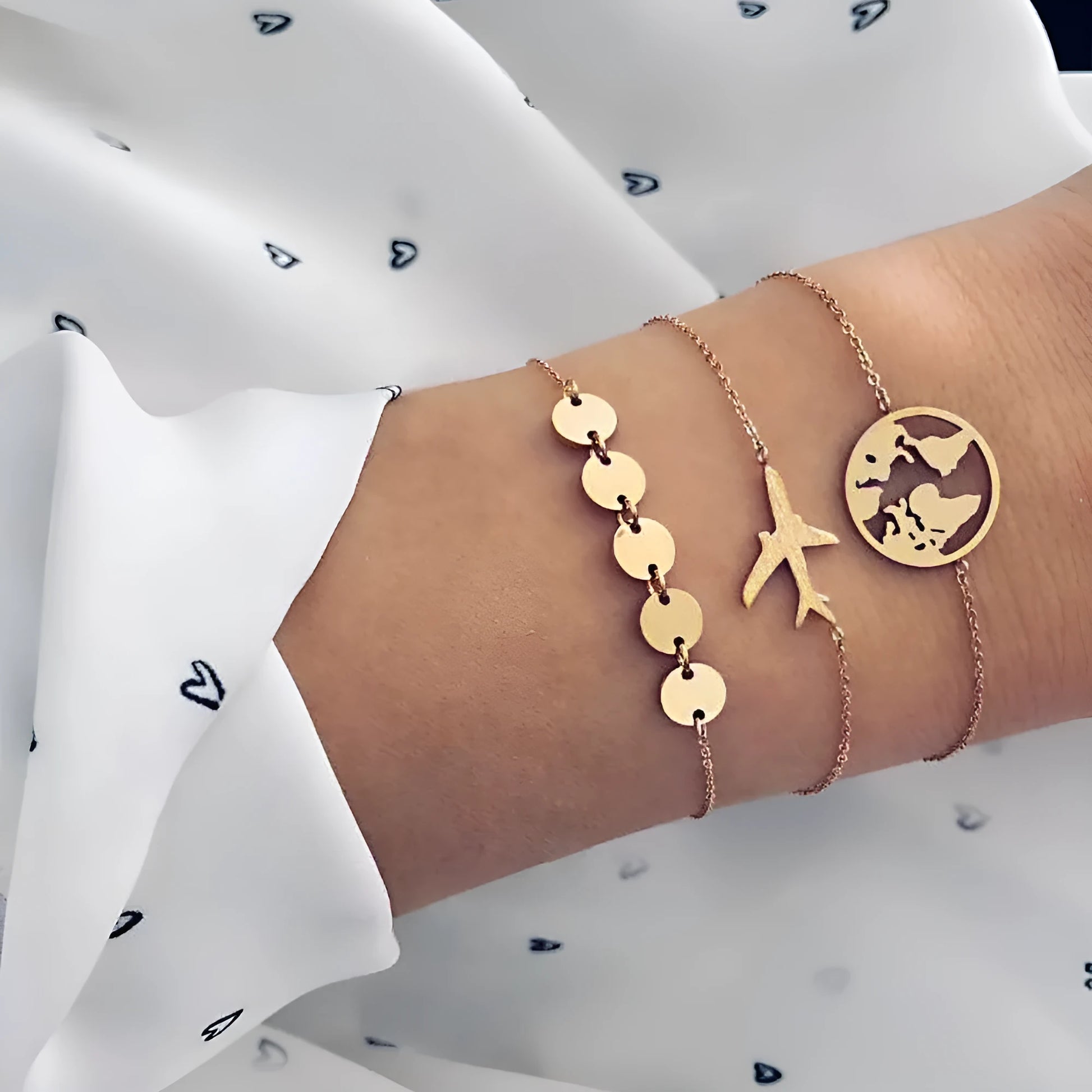 Three alloy charm bracelets with heart-shaped bohemian aircraft map designs, colour Sku2104.
