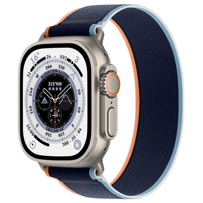 Nylon Apple Watch band with single ring strap closure in multiple colour options on a wrist