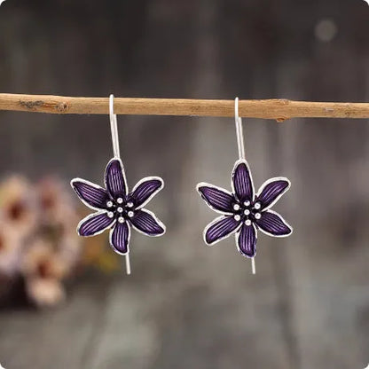 Retro purple flower alloy earrings with electroplated finish, approximately 2cm diameter