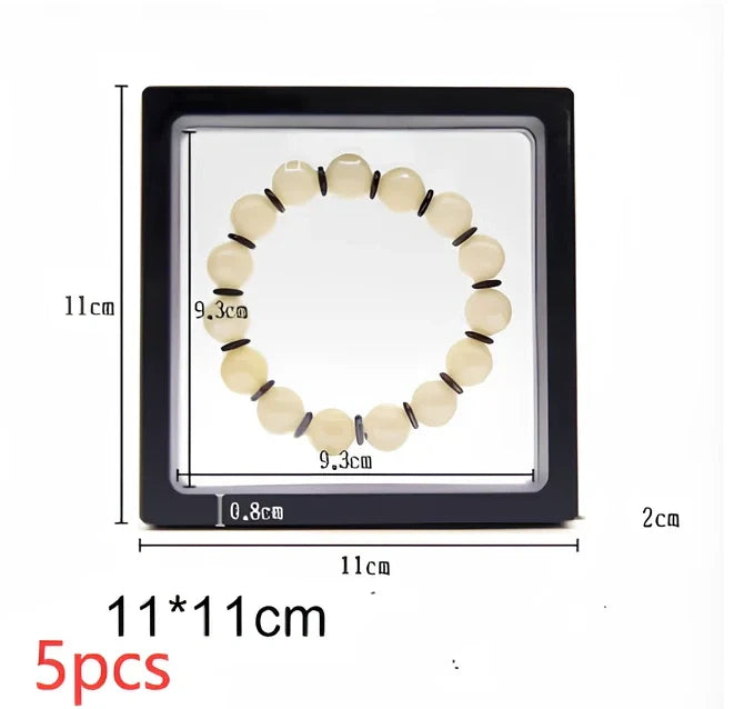 Black 11x11cm suspended 3D floating display frame holding a coin, with square base for stable collectible showcase
