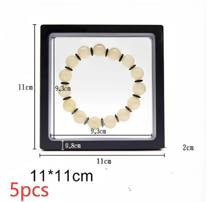 Black 11x11cm suspended 3D floating display frame holding a coin, with square base for stable collectible showcase