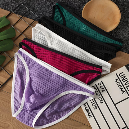 Men's low waist transparent lace underwear in various colours on a size chart background.
