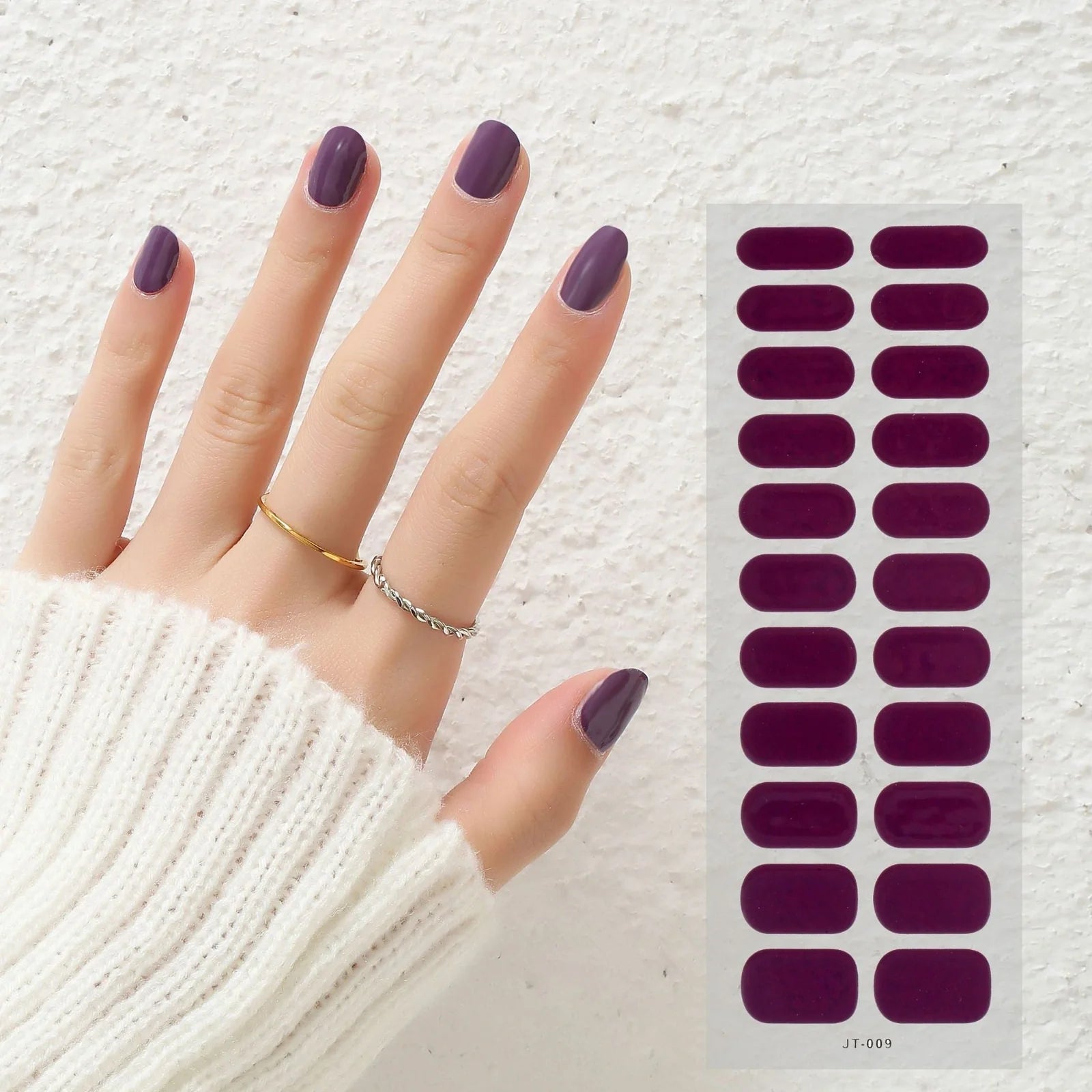 Semi-curing gel nail stickers sheet showing 22 solid colour designs including roses, tulips, and geometric patterns