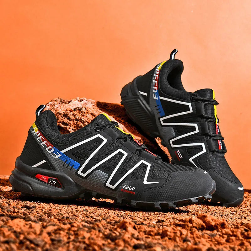 Men's low-top casual shoe in grey orange with synthetic leather upper and mesh lining.