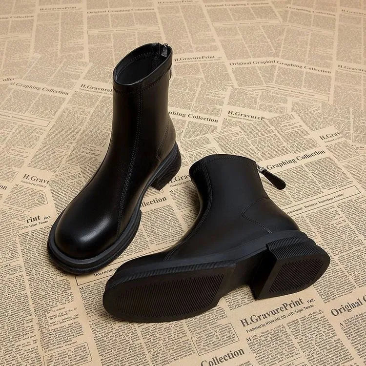 Women's black flat heel ankle boots with back zipper and round toe